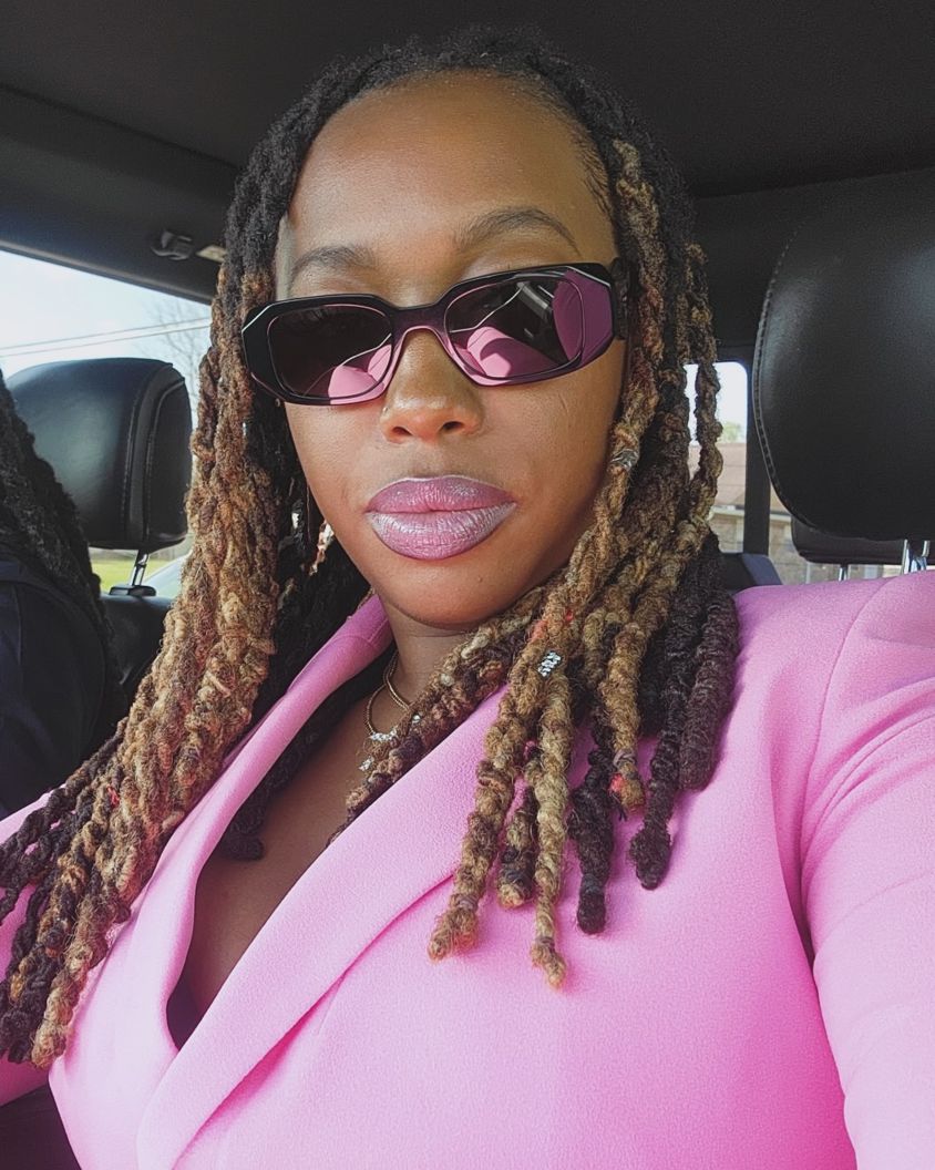Zee Harrison in a pink blazer